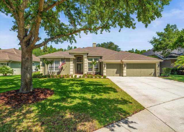 Property at 19808 Sunsplash Ln, Lutz, FL 33558, 5 beds, 3 baths
