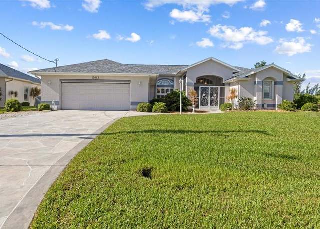 Property at 10557 Washington Rd, Port Charlotte, FL 33981, 3 beds, 3.5 baths