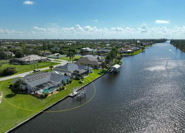 Property at 10557 Washington Rd, Port Charlotte, FL 33981, 3 beds, 3.5 baths