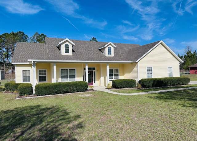 Property at 11350 NW 73rd Ct, Chiefland, FL 32626, 4 beds, 2 baths