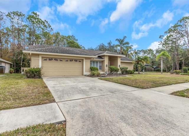 Property at 599 Centerwood Dr, Tarpon Springs, FL 34688, 3 beds, 2 baths