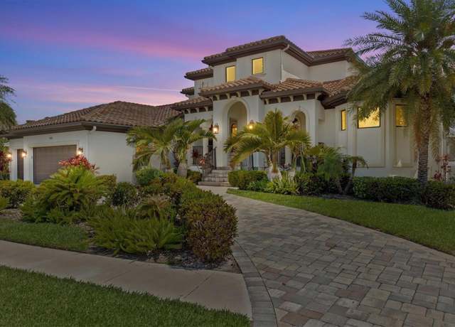 Property at 949 Symphony Isles Blvd, Apollo Beach, FL 33572, 4 beds, 4.5 baths