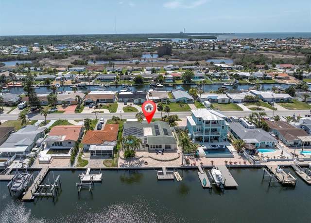 Property at 4055 Floramar Ter, New Port Richey, FL 34652, 4 beds, 3 baths