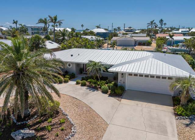 Property at 606 Emerald Ln, Holmes Beach, FL 34217, 3 beds, 3 baths