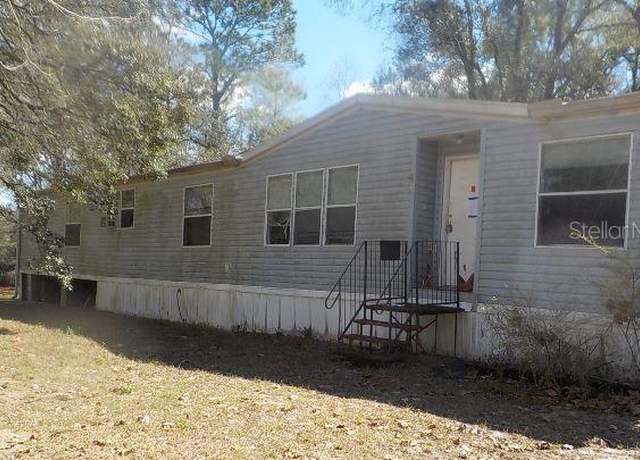 Property at 21150 SE 68th Ln, Morriston, FL 32668, 4 beds, 3 baths