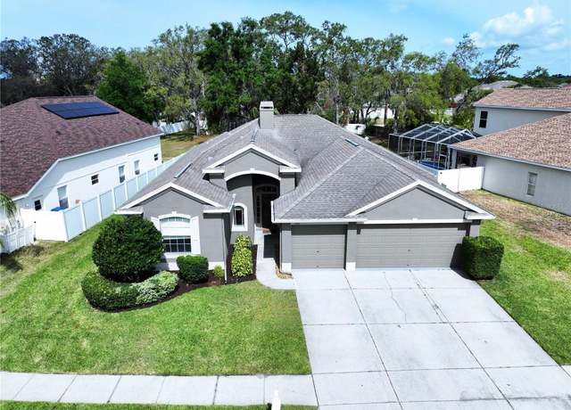 Property at 1919 Oswego Dr, Holiday, FL 34691, 4 beds, 2 baths