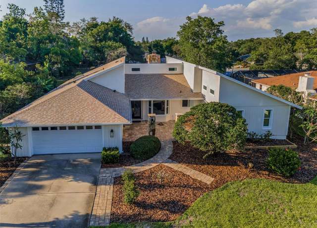 Property at 833 Lakeside Ter, Palm Harbor, FL 34683, 4 beds, 3.5 baths