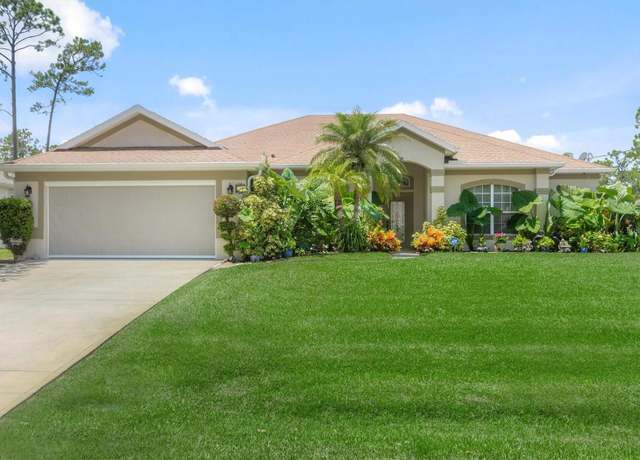 Property at 10 Woodgate Pl, Palm Coast, FL 32164, 4 beds, 2 baths