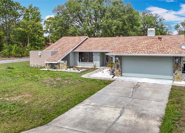 Property at 12087 Tallwood St, Spring Hill, FL 34608, 3 beds, 2 baths