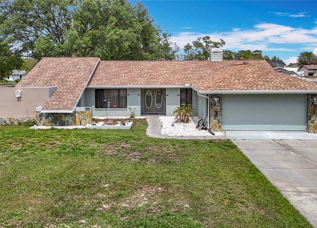 Property at 12087 Tallwood St, Spring Hill, FL 34608, 3 beds, 2 baths