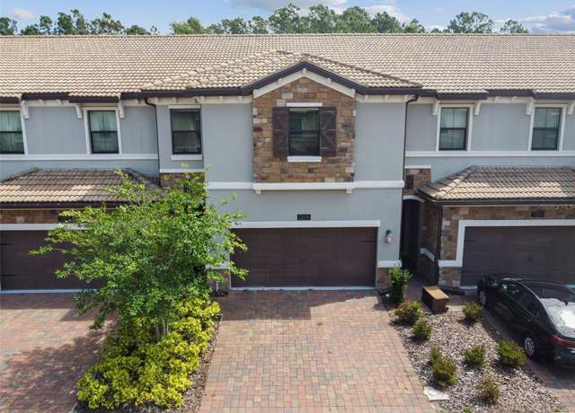 Property at 1209 Payne Stewart Dr, Davenport, FL 33896, 4 beds, 3.5 baths