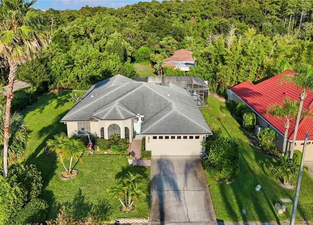 Property at 1603 Polo Club Dr, Tarpon Springs, FL 34689, 4 beds, 3 baths