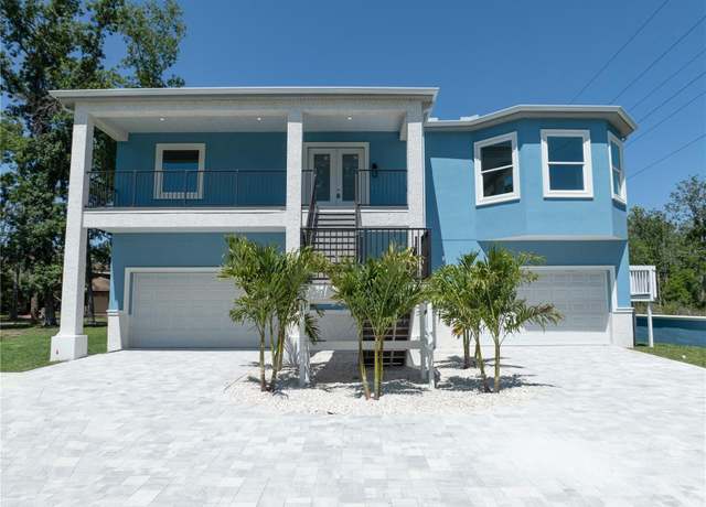 Property at 1033 Hammock Cir, Tarpon Springs, FL 34688, 4 beds, 4.5 baths