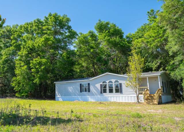 Property at 11002 SW 282nd St, Newberry, FL 32669, 3 beds, 2 baths