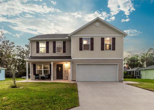 Property at 10 Pickcane Ln, Palm Coast, FL 32164, 4 beds, 2.5 baths