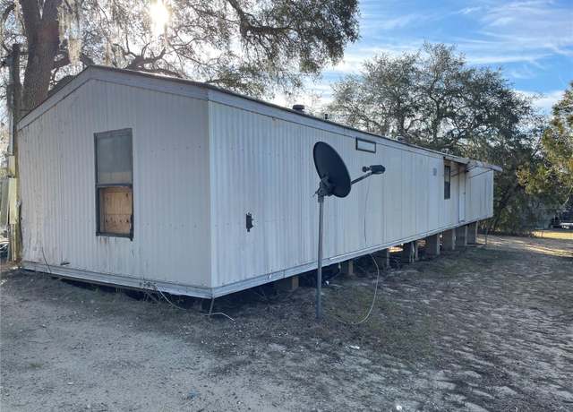 Property at 14051 SE 203rd Ct, Umatilla, FL 32784, 3 beds, 2 baths