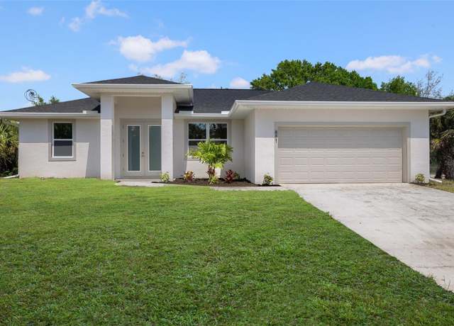 Property at 881 Spaulding St E, Lehigh Acres, FL 33974, 3 beds, 2 baths