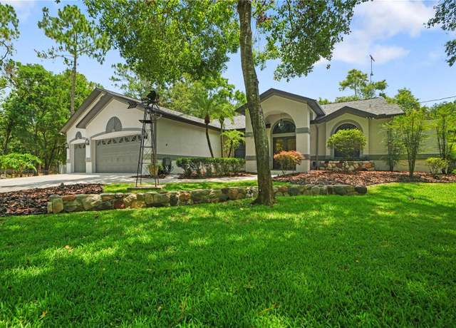 Property at 8518 Quail Hollow Blvd, Wesley Chapel, FL 33544, 5 beds, 3 baths