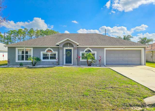 Property at 18 Kalamazoo Trl, Palm Coast, FL 32164, 4 beds, 2 baths