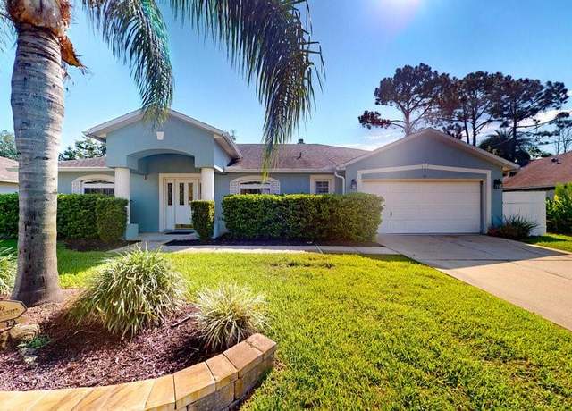 Property at 22 Wood Clift Ln, Palm Coast, FL 32164, 4 beds, 2 baths