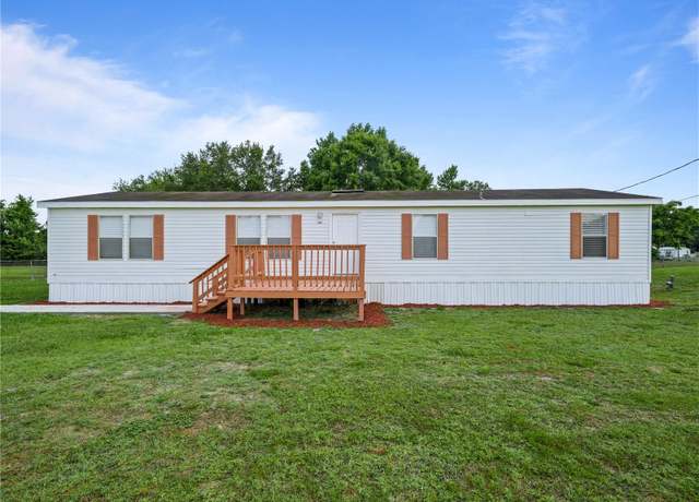 Property at 1302 Windsong Dr, Lakeland, FL 33811, 4 beds, 2 baths