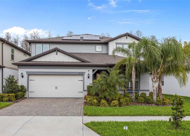 Property at 20718 Monza Loop, Land O Lakes, FL 34638, 5 beds, 4.5 baths