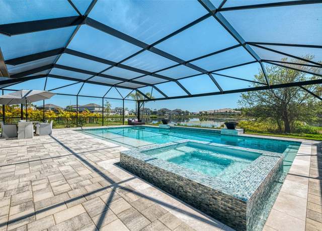 Property at 9487 Tequila Sunrise Dr, Sarasota, FL 34241, 5 beds, 4.5 baths