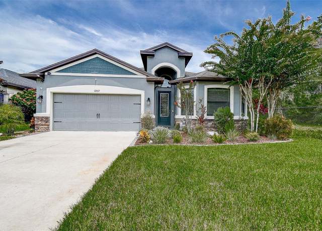 Property at 12417 Sourwood Way, New Port Richey, FL 34654, 4 beds, 3 baths