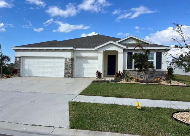 Property at 1027 Ocean Spray Dr, Ruskin, FL 33570, 4 beds, 3.5 baths