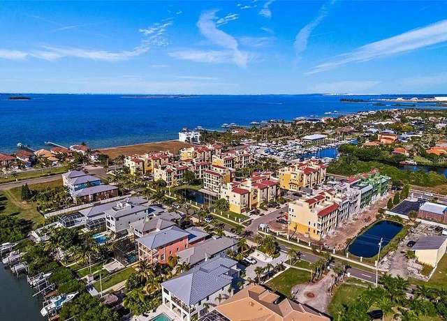 Property at 6418 Margarita Shores Ln, Apollo Beach, FL 33572, 4 beds, 3.5 baths