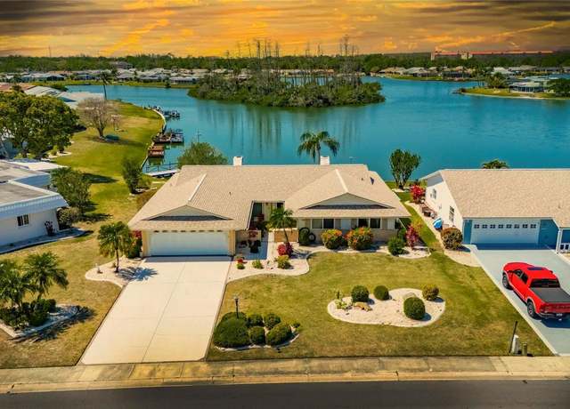 Property at 1504 Valley Forge Blvd, Sun City Center, FL 33573, 3 beds, 2.5 baths