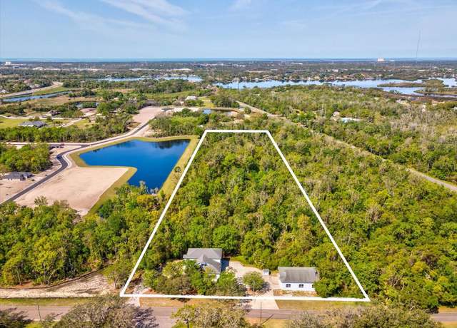 Property at 920 E Lake Dr, Tarpon Springs, FL 34688, 4 beds, 4 baths