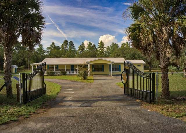 Property at 23061 SW Nautilus Blvd, Dunnellon, FL 34431, 4 beds, 2 baths