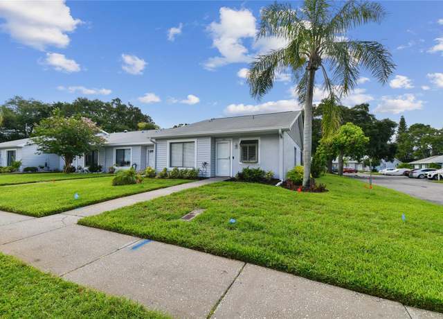Property at 211 Somerset Cirle N, Dunedin, FL 34698, 2 beds, 2 baths