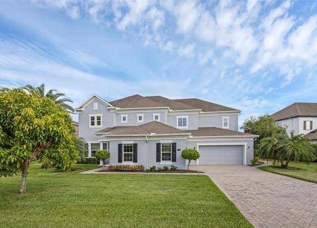 Property at 16086 Johns Lake Overlook Dr, Winter Garden, FL 34787, 5 beds, 5 baths