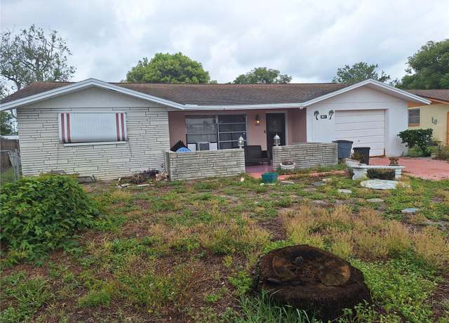 Property at 7631 Briarwood Dr, Port Richey, FL 34668, 2 beds, 2.5 baths