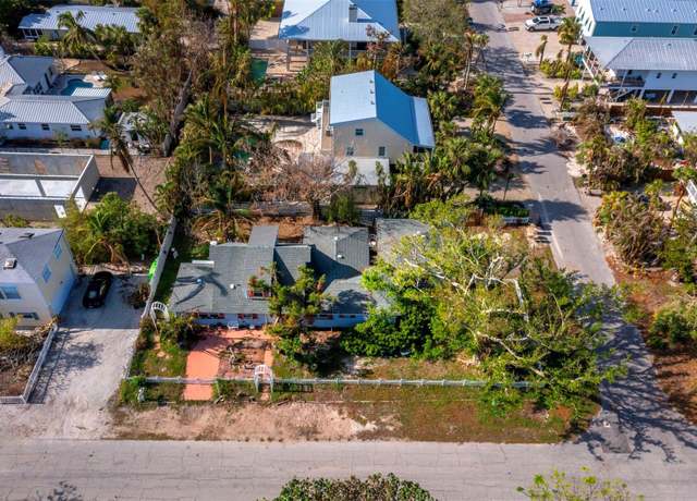 Property at 6901 Poinsettia Ave, Longboat Key, FL 34228, 4 beds, 3 baths