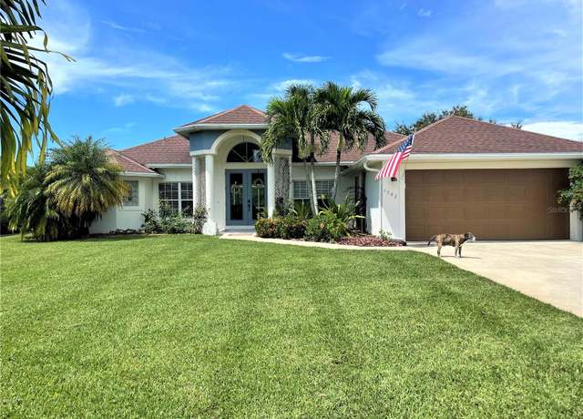Property at 1042 Boundary Blvd, Rotonda West, FL 33947, 4 beds, 3 baths