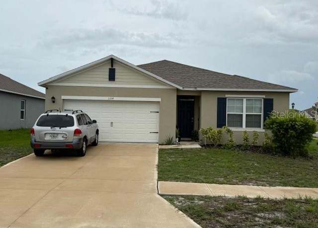 Property at 1104 Star Ruby Ln, Winter Haven, FL 33880, 4 beds, 2 baths