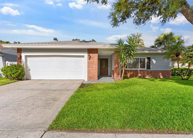Property at 1667 E Orangeside Rd, Palm Harbor, FL 34683, 4 beds, 2 baths