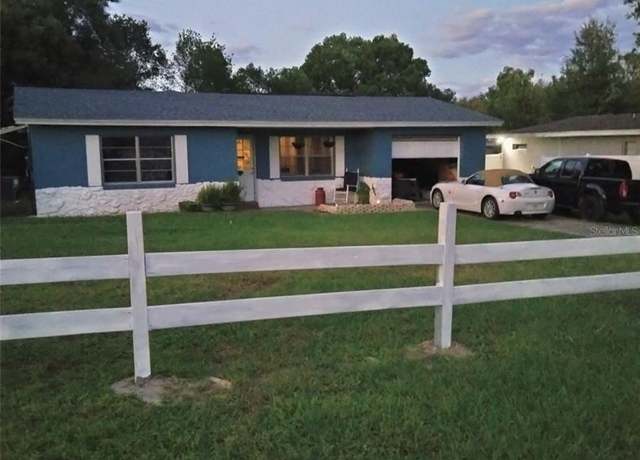 Property at 205 E Holly Dr, Orange City, FL 32763, 4 beds, 2 baths