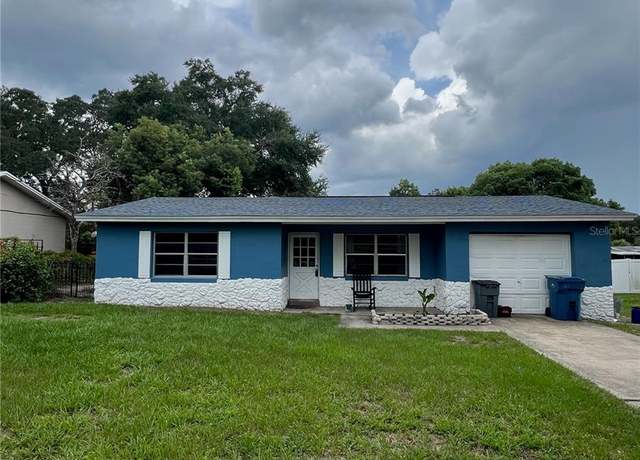 Property at 205 E Holly Dr, Orange City, FL 32763, 4 beds, 2 baths