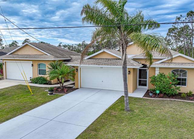 Property at 215 Australian Dr, Rotonda West, FL 33947, 3 beds, 2.5 baths