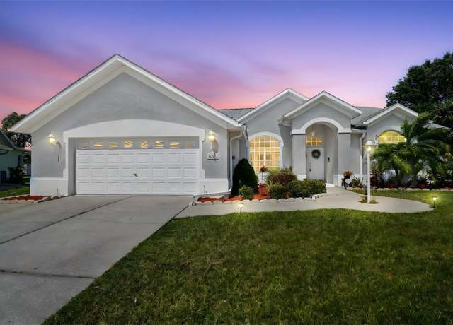 Property at 12447 Vogue Ct, New Port Richey, FL 34654, 4 beds, 3 baths