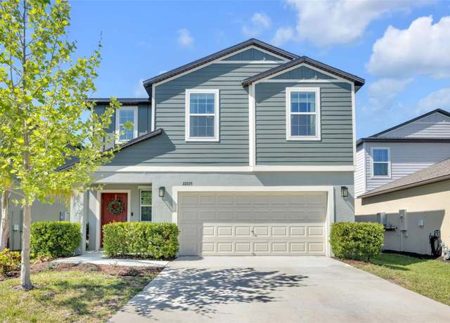 Property at 22223 Storybook Cabin Way, Land O Lakes, FL 34637, 4 beds, 2.5 baths
