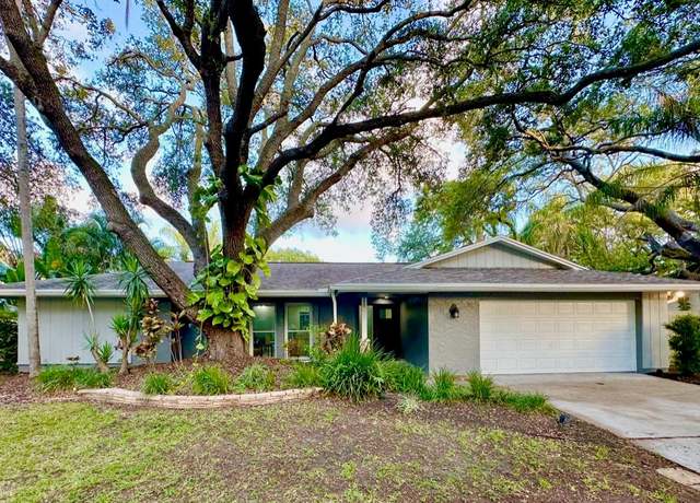 Property at 939 Woodland Dr, Palm Harbor, FL 34683, 4 beds, 3 baths