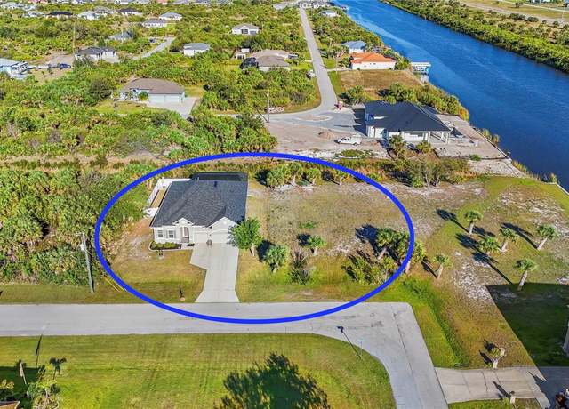 Property at 10498 Bay State Dr, Port Charlotte, FL 33981, 4 beds, 3 baths