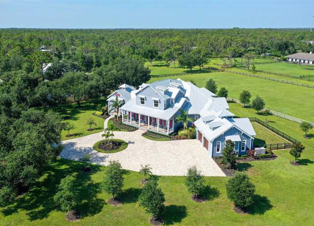 Property at 6910 211th St E, Bradenton, FL 34211, 7 beds, 5.5 baths