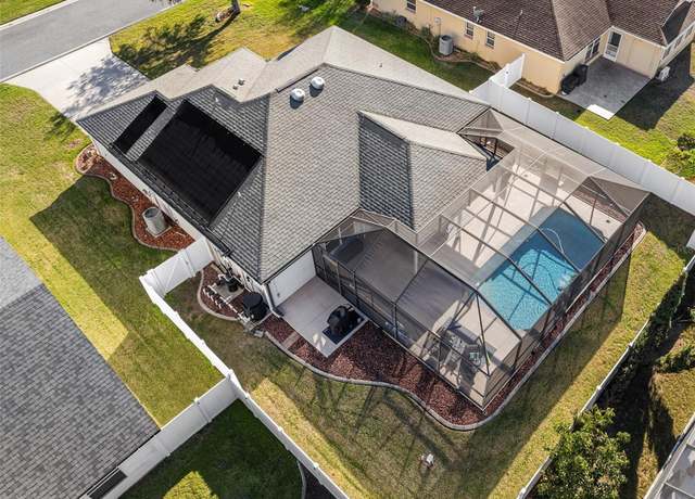 Property at 12038 NE 51st Cir, Oxford, FL 34484, 3 beds, 2 baths