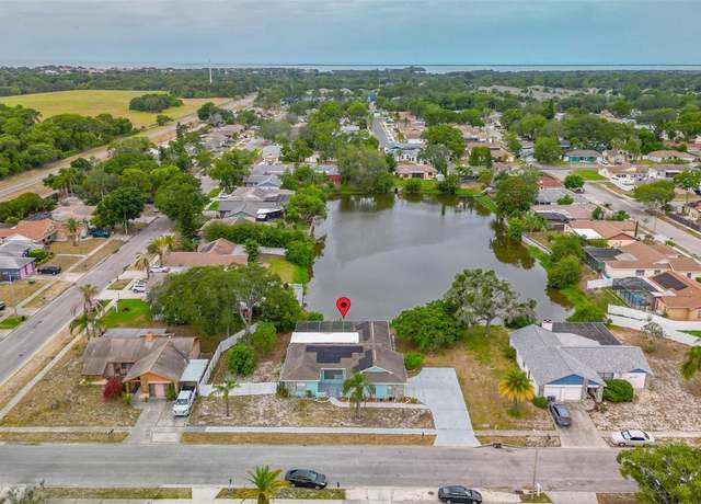 Property at 1023 Springtime Dr, Holiday, FL 34691, 3 beds, 2.5 baths